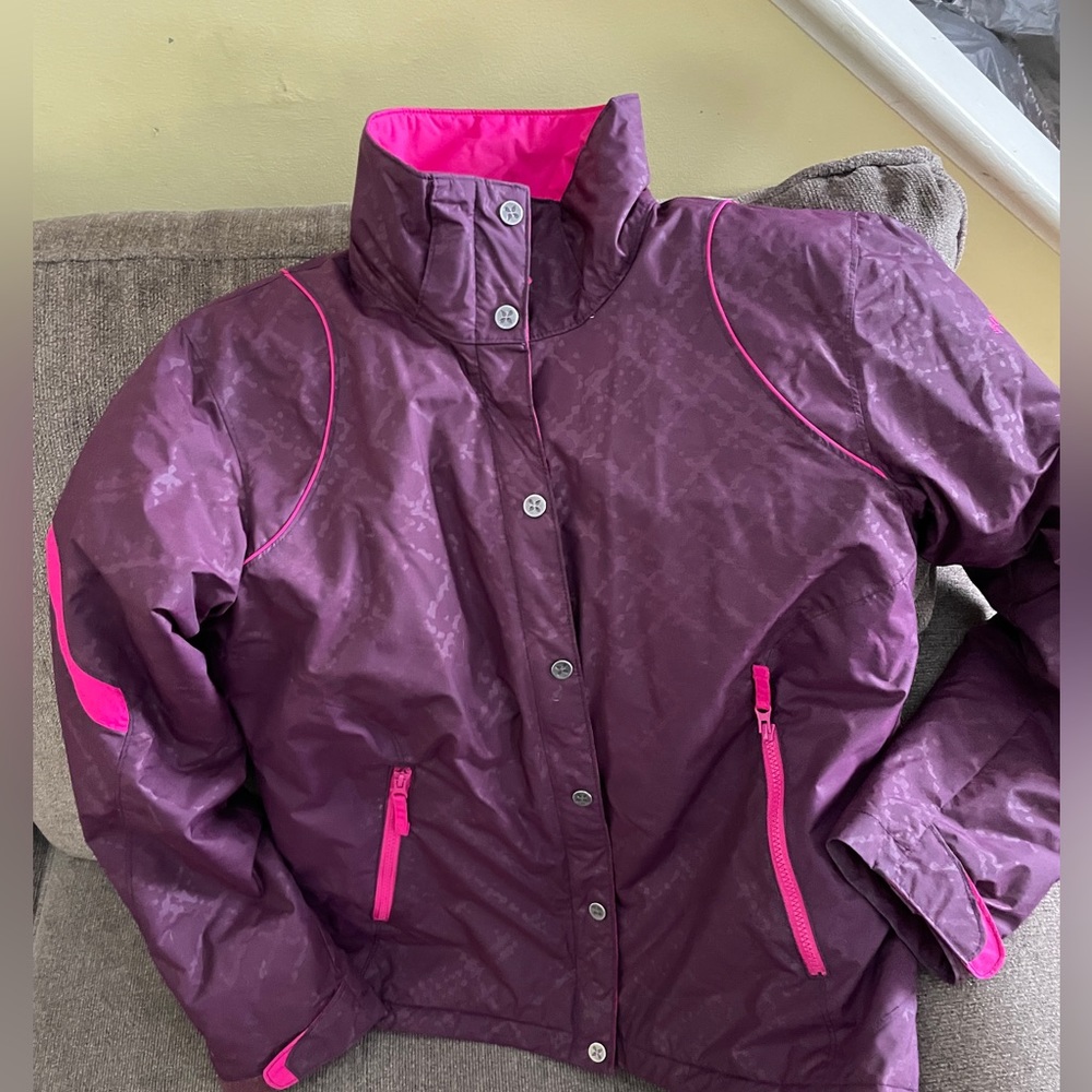Columbia woman’s jacket. Size large. Purple with pink piping.